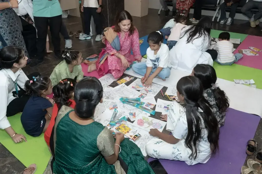 Kids enjoying a fun educational activity at a family awareness event hosted by Neelam Hospital in Rajpura, Punjab.