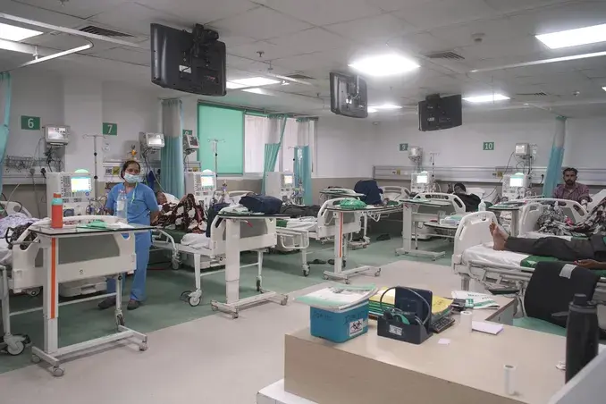 Dialysis ward with patients receiving hemodialysis care at Neelam Hospital