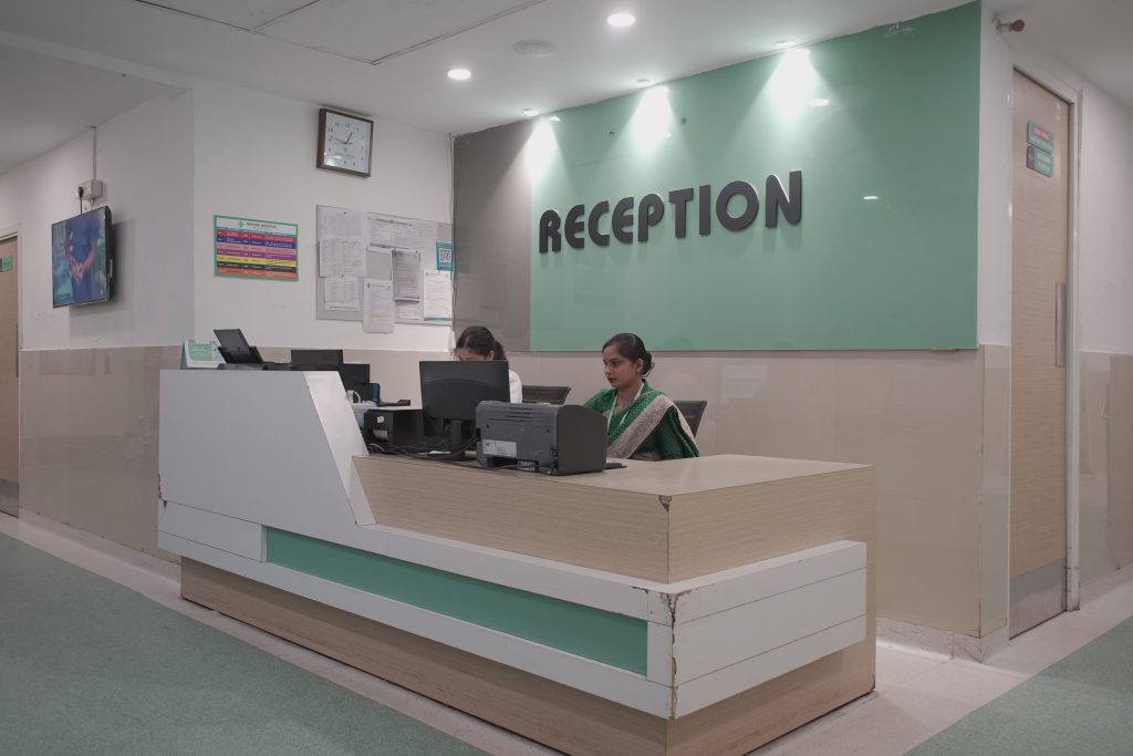 Radiology reception and patient registration desk at Neelam Hospital, Rajpura, Punjab providing seamless support for CT Scan, MRI, and advanced diagnostic imaging services.